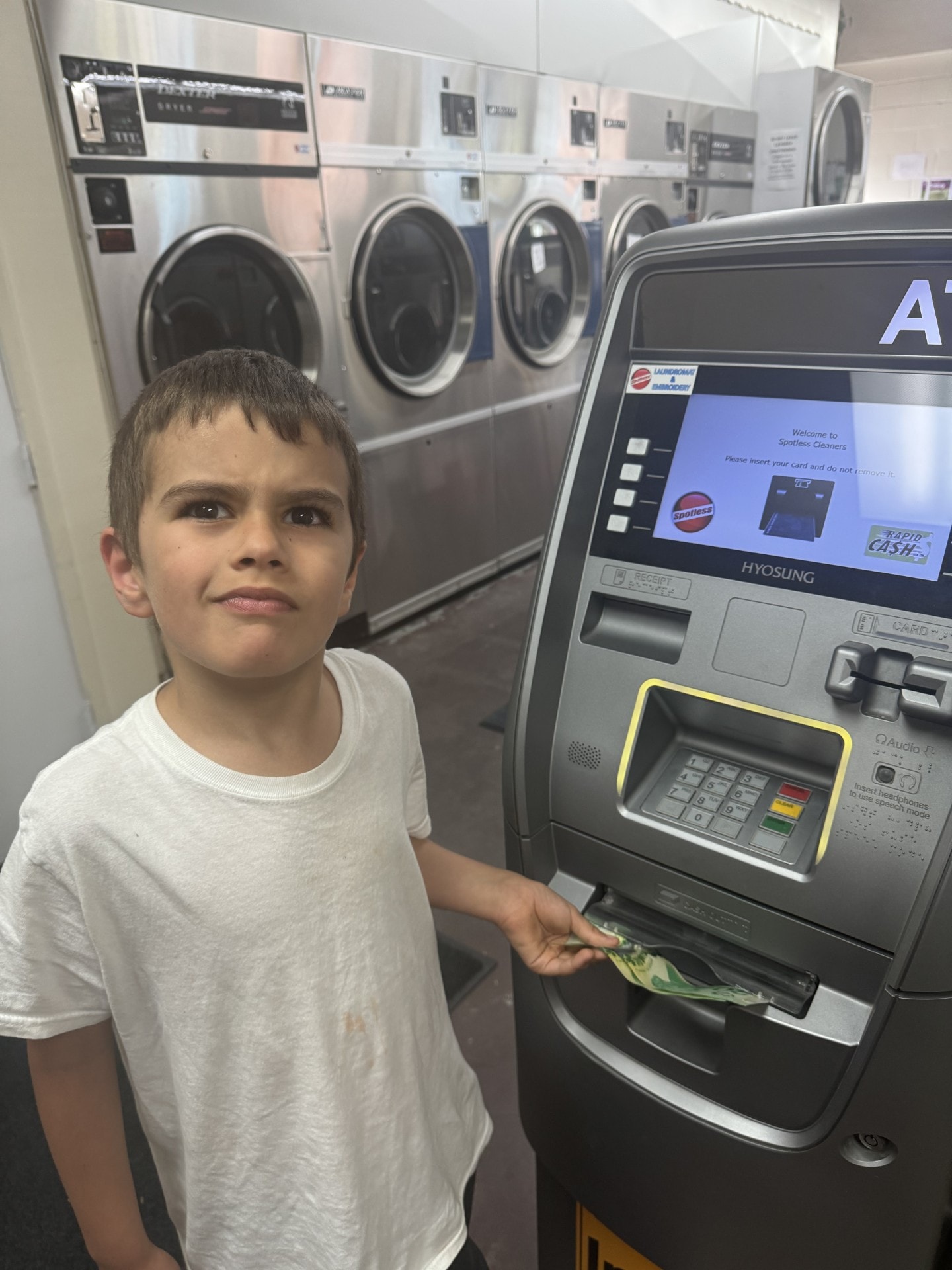 ATM available at Spotless Cleaning Centre laundromat